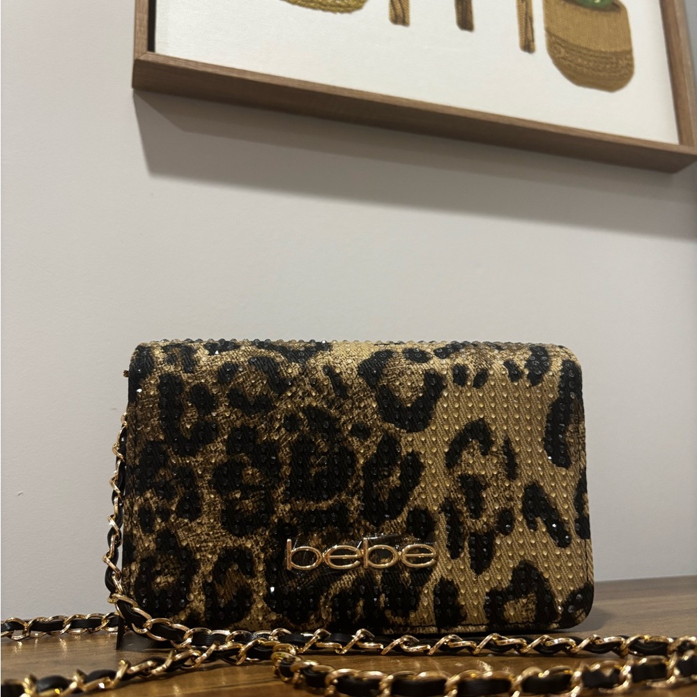 Bebe Gold and Black Leopard Clutch